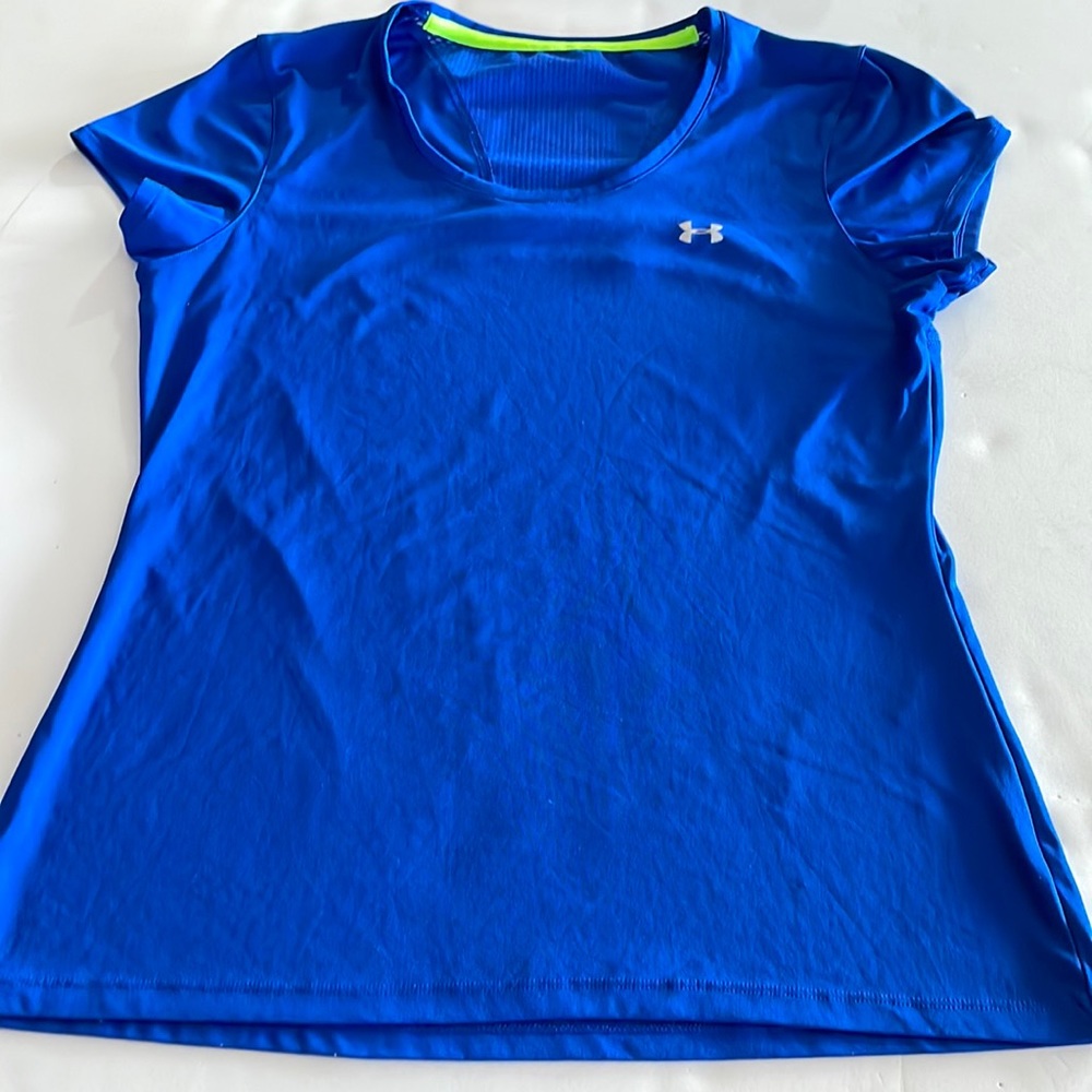 Under Amour heat gear shirt. Tag is missing but I know it is a medium.